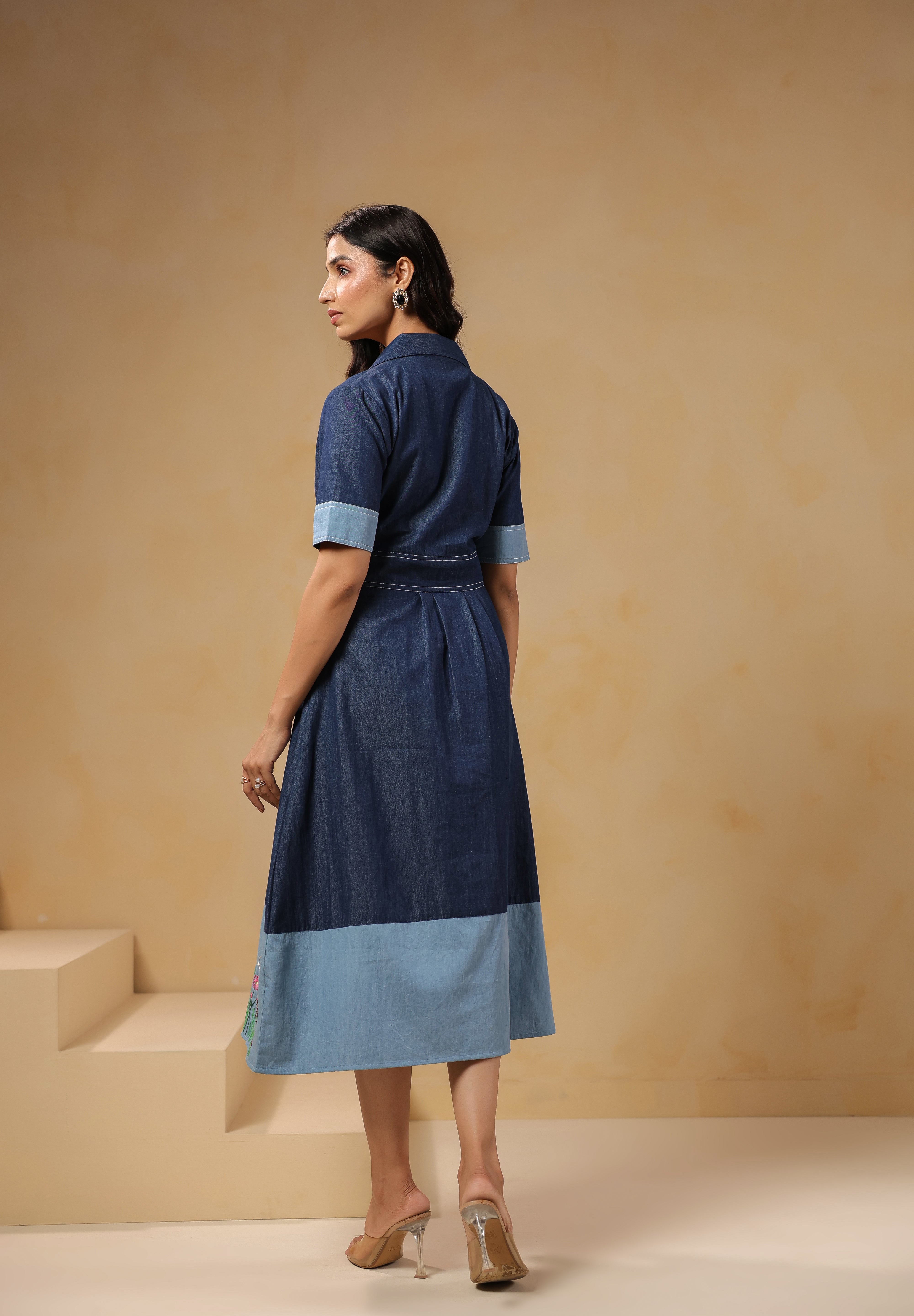 Back view of Woodland Muse Midi Dress with contrast cuff sleeves and flared hemline