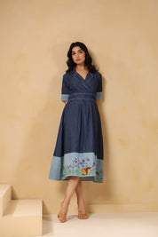 Relaxed pose wearing the Woodland Muse Midi Dress, perfect for everyday chic styling