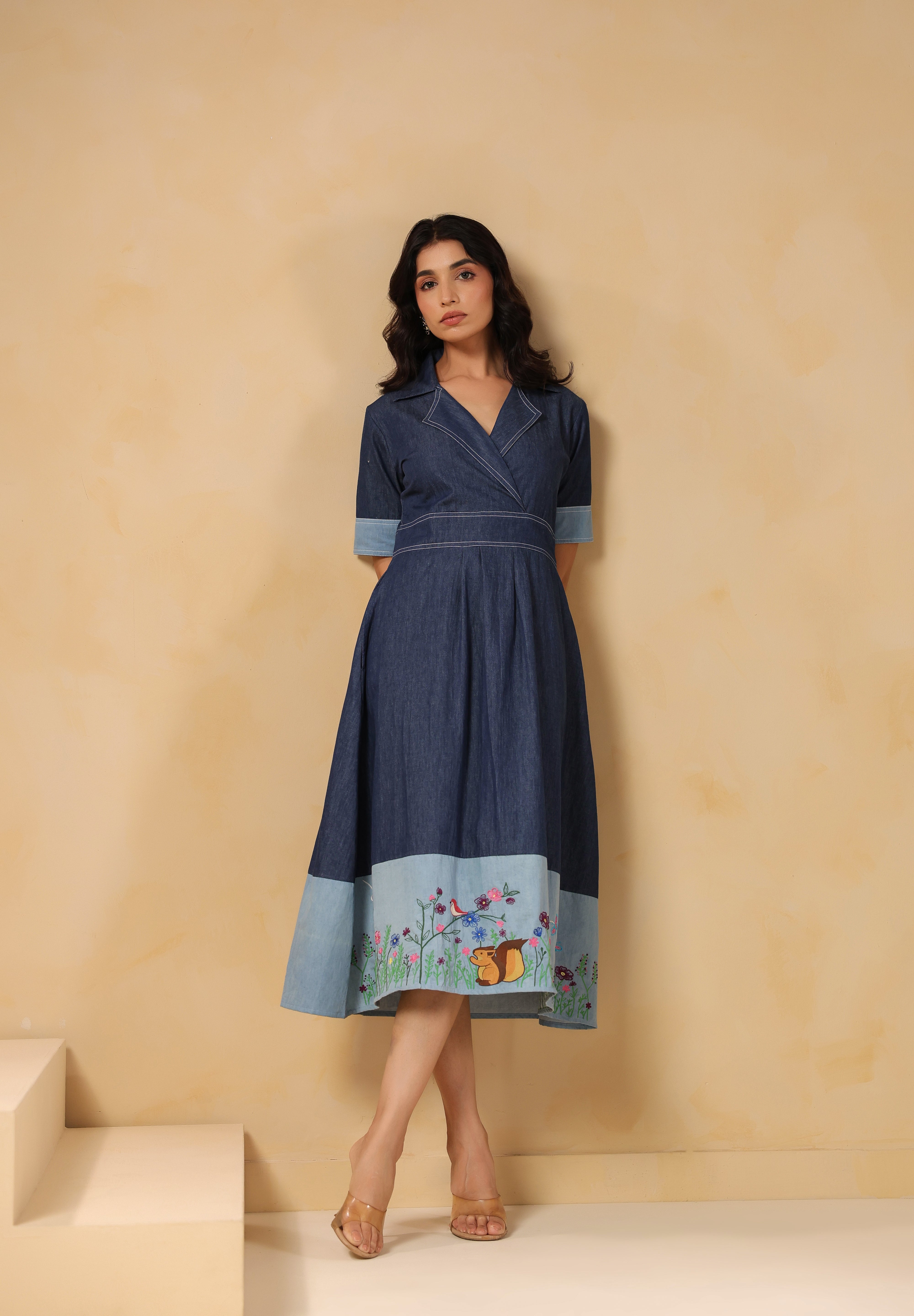 Relaxed pose wearing the Woodland Muse Midi Dress, perfect for everyday chic styling