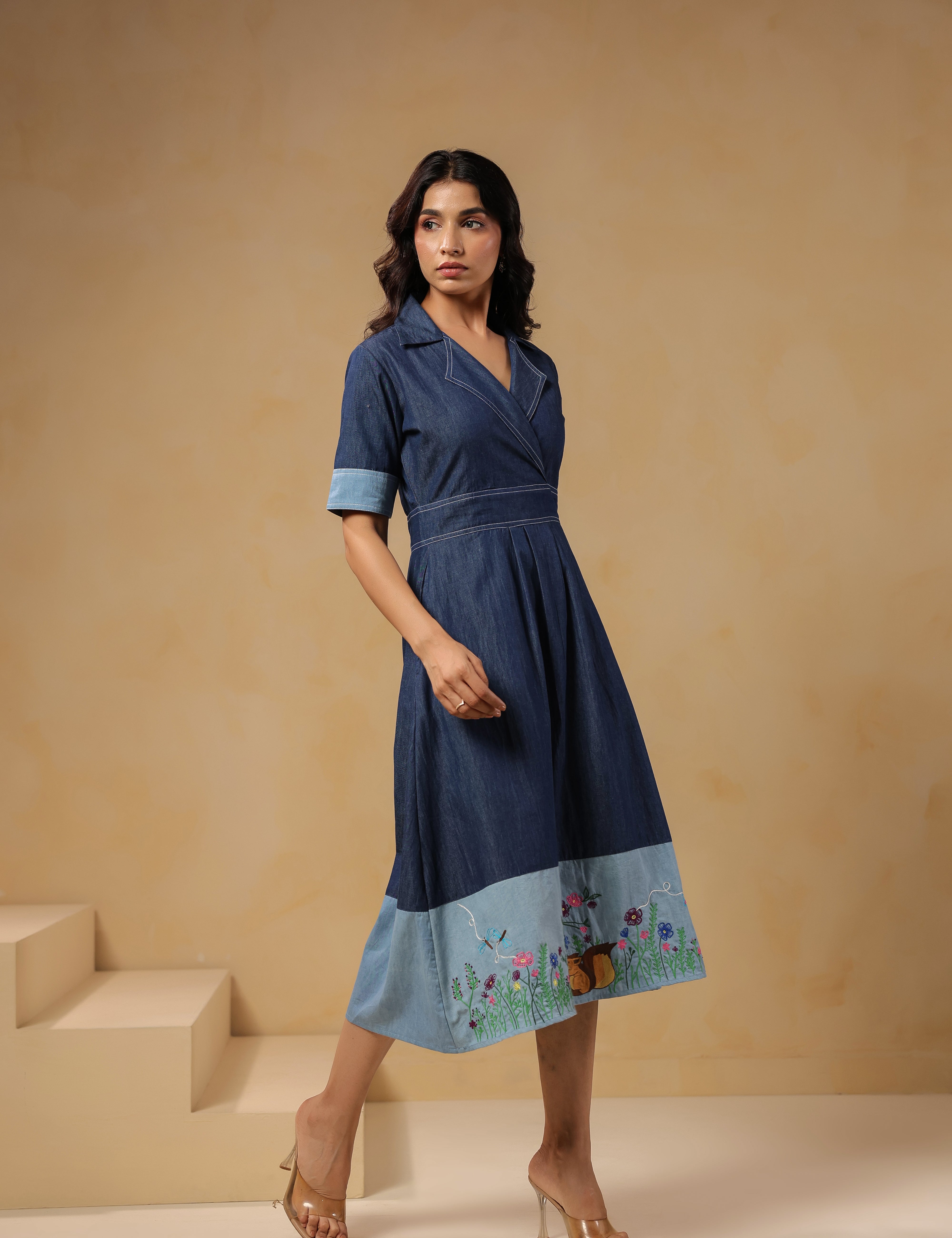 Side profile of Woodland Muse Midi Dress showing wrap-style neckline and structured fit