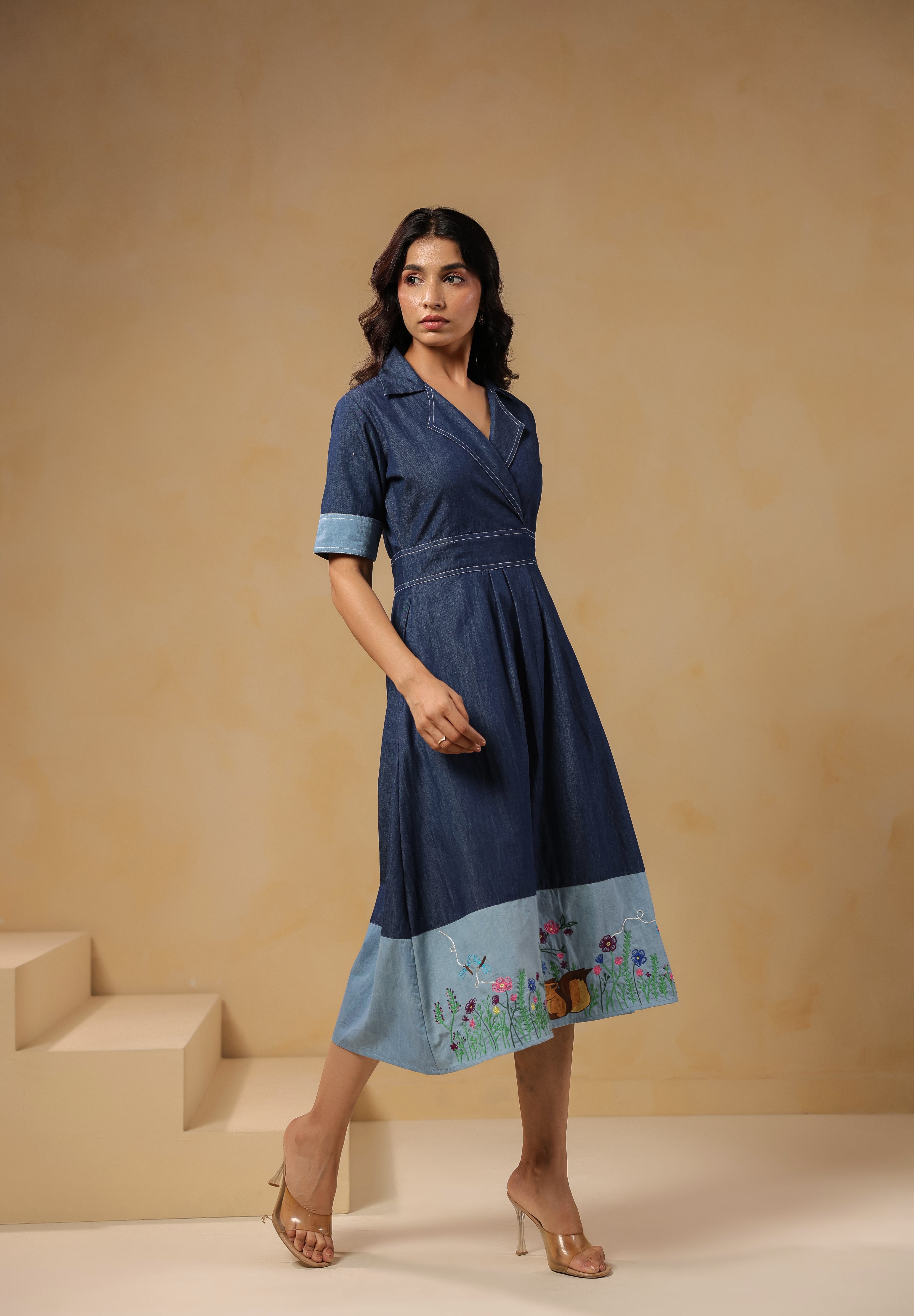 Side profile of Woodland Muse Midi Dress showing wrap-style neckline and structured fit